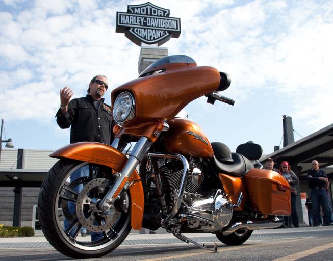 Bill Davidson, great-grandson of Harley-Davidson co-founder William A. Davidson, kicks-off Harley-Davidson's 110th Anniversary celebration by taking delivery of a new 2014 Harley-Davidson Street Glide Special directly from employees at the company's final assembly plant in York, Pa.
