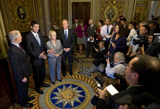 From left, Sen. Jeff Sessions, R-Ala., House Budget Committee Chairman Paul Ryan, R-Wisc., Senate Budget Committee Chair Patty Murray, D-Wash., and Rep. Chris Van Hollen, D-Md., outline their approach to tackling the nations debt problems in the Senate Reception Room at the Capitol in Washington, Thursday, Oct. 17, 2013. With last-minute legislation passed in Congress that reopened the government and averted a national default, bipartisan budget conferees from both houses of Congress emerge from an initial meeting in the Capitol.