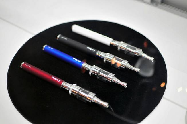 Several e-cigarettes are on display at The Vapery, a local vapor shop located at 8060 S. Rainbow Road, on Friday, Oct. 11, 2013. The rise in e-cigarette use among young adults and teenagers is a growing concern among health officials, who have long waged a public health campaign against smoking.