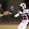 Photo: Coronado quarterback Jackson Cofer hands the ball Photo: Coronado quarterback Jackson Cofer hands the ball
