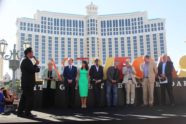 Radio host Manny talks to Las Vegas Mayor Carolyn Goodman, left, Clark County Commissioner Steve Sisolak, right, and the cast of the film Last Vegas, from left, Kevin Kline, Mary Steenburgen, Morgan Freeman, Robert De Niro, Michael Douglas and director Jon Turteltaub Friday, Oct. 18, 2013 in front of the Bellagio.