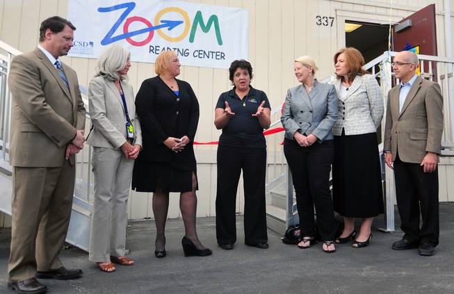 UNLV law professor Sylvia Lazos talks about the benefits of the Zoom Reading Centers on Wednesday, October 23, 2013, at Lunt Elementary School. From left to right: Clark County Schools Superintendent Pat Skorkowsky, Lunt Principal Thelma Davis, Academic Manager Danielle Miller, UNLV law professor Sylvia Lazos, School Board members Lorraine Alderman and Patrice Tew and State Senator Mo Denis.