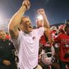 UNLV head coach Bobby Hauck celebrates after defeating UNR 27-22 on Saturday, Oct. 26, 2013, at Mackay Stadium in Reno. UNLV head coach Bobby Hauck celebrates after defeating UNR 27-22 on Saturday, Oct. 26, 2013, at Mackay Stadium in Reno.