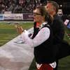UNLV athletic director Tina Kunzer-Murphy cheers the Rebels on during their game against UNR Saturday, Oct. 26, 2013 at Mackay Stadium in Reno. UNLV defeated UNR 27-22 to reclaim the Fremont Cannon. UNLV athletic director Tina Kunzer-Murphy cheers the Rebels on during their game against UNR Saturday, Oct. 26, 2013 at Mackay Stadium in Reno. UNLV defeated UNR 27-22 to reclaim the Fremont Cannon.