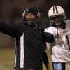 Photo: Canyon Springs head coach Hunkie Cooper shouts ord Photo: Canyon Springs head coach Hunkie Cooper shouts ord