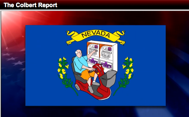 In a segment focusing on the controversy over Nevada Assemblyman Jim Wheeler’s recent comments on slavery, “The Colbert Report” host Stephen Colbert sarcastically suggested that Wheeler’s comments were not an embarrassment to Nevada. “Oh, come on, there is nothing that embarrasses the state of Nevada,” Colbert said during the segment, broadcast Oct. 31, 2013. “For Pete’s sake, the state flag is a man on a Jazzy pumping nickels into a slot machine.”