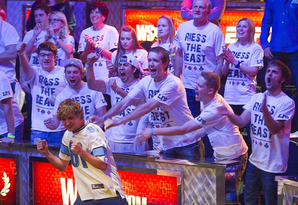 Ryan Riess, 23, celebrates with family and supporters after knocking out Michiel Brummelhuis, 32, during the final table of the World Series of Poker $10,000 buy-in, no-limit Texas Hold 'Em tournament at the Rio on Monday, Nov. 4, 2013.