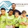 President and CEO Ken Rubeli poses for a photo with 8- and 9-year-old boys attending the Boys' Night Out event at the Lied Memorial Boys & Girls Club on Thursday, Nov. 14, 2013. President and CEO Ken Rubeli poses for a photo with 8- and 9-year-old boys attending the Boys' Night Out event at the Lied Memorial Boys & Girls Club on Thursday, Nov. 14, 2013.