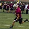 Photo: Faith Lutheran's Trent Dolby turns the corner on a Photo: Faith Lutheran's Trent Dolby turns the corner on a