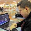 Joseph Brennen of Ventnor, N.J., logs on to a Harrah's online casino on his laptop from a highway rest area in Egg Harbor Township, N.J. on Thursday, Nov. 21, 2013, the first day of a test of Internet gambling in New Jersey. Joseph Brennen of Ventnor, N.J., logs on to a Harrah's online casino on his laptop from a highway rest area in Egg Harbor Township, N.J. on Thursday, Nov. 21, 2013, the first day of a test of Internet gambling in New Jersey.