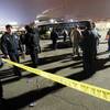 Photo: Kansas City, Mo., police work a crime scene in par Photo: Kansas City, Mo., police work a crime scene in par