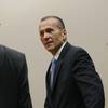 Photo: Martin MacNeill greets his defense team as he ente Photo: Martin MacNeill greets his defense team as he ente