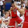 UNLV forward Chris Wood and guard Kendall Smith defend Arizona guard T.J. McConnell during their game at the McKale Center in Tucson Saturday, Dec. 7, 2013. Arizona won the game 63-58. UNLV forward Chris Wood and guard Kendall Smith defend Arizona guard T.J. McConnell during their game at the McKale Center in Tucson Saturday, Dec. 7, 2013. Arizona won the game 63-58.