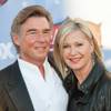 John Easterling and Olivia Newton-John arrive at the 2013 American Country Awards on Tuesday, Dec. 10, 2013, at Mandalay Bay Events Center. John Easterling and Olivia Newton-John arrive at the 2013 American Country Awards on Tuesday, Dec. 10, 2013, at Mandalay Bay Events Center.