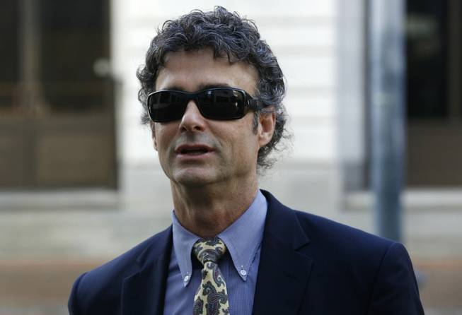 Former BP drilling engineer Kurt Mix arrives at the Hale Boggs Federal Building in New Orleans, Tuesday, Dec. 3, 2013. Jurors are deadlocked in Mix's trial on two counts of obstruction of justice. He is charged with deleting text messages about the company's response to its massive 2010 oil spill in the Gulf of Mexico.