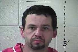 This Thursday, Dec. 19, 2013, booking photograph released by the Hancock County Sheriff's Department in Bay St. Louis, Miss., shows James Smith, who has been charged with abducting two young brothers, ages 5 and 8, sexually assaulting at least one of them and slashing the older boy's throat. Don Bass, chief deputy with Hancock County sheriff's office on the Mississippi coast, said Thursday that the 8-year-old boy is hospitalized and is expected to survive.