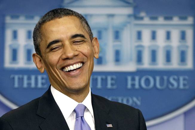 President Barack Obama smiles as he prepares to answer a question during an end-of-the year news conference in the Brady Press Briefing Room at the White House in Washington, Friday, Dec. 20, 2013. Obama will depart later for his home state of Hawaii for his annual Christmas vacation trip. It's the first time in his presidency that his departure plans have not been delayed by legislative action in Washington. (