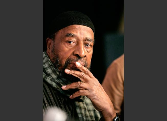 In this Sunday, Sept. 2, 2007, file photo, jazz flutist Yusef Lateef discusses his music in the Jazz Talk Tent at Hart Plaza at the Detroit International Jazz Festival in Detroit. Grammy-winning musician and composer Lateef, one of the first to incorporate world music into traditional jazz, died Monday, Dec. 23, 2013. He was 93.