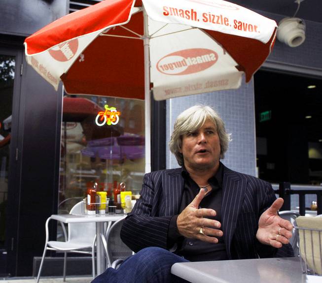 Smashburger founder Tom Ryan speaks Thursday, Sept. 6, 2012, about an effort to get more customers to notice that his restaurants offer beer in Denver. The Denver-based chain has teamed up with Fort Collins, Colo.-based New Belgium Brewing Co. to choose which New Belgium beers to pair with items on its Colorado menus.