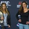 Photo: Ronda Rousey and Miesha Tate pose near the end of Photo: Ronda Rousey and Miesha Tate pose near the end of
