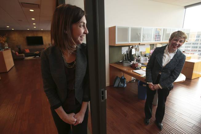 Annenberg Foundation Grants Manager Allison Gister, left, and Annenberg Space for Photography Ventures General Manager Carol Laumen used a clandestine plan to secure the return of valuable native American masks from a Paris auction last week. They are photographed in the office in Los Angeles where they spent the wee hours of December 9 executing the deal with telephone and online bids.