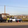 A Henderson Police officer stands by as a tow truck driver prepares to tow a pickup truck from the scene of a fatal auto pedestrian accident near Galleria Drive and Boulder Highway in Henderson Monday, Dec. 30, 2013. A Henderson Police officer stands by as a tow truck driver prepares to tow a pickup truck from the scene of a fatal auto pedestrian accident near Galleria Drive and Boulder Highway in Henderson Monday, Dec. 30, 2013.