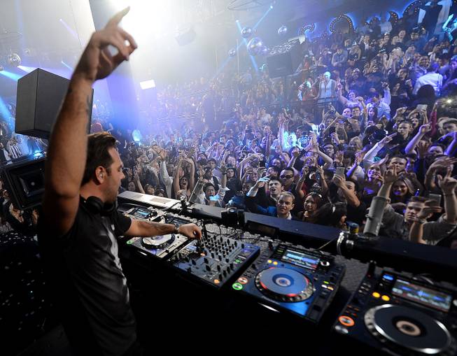 Sebastian Ingrosso spins at Light on Tuesday, Dec. 31, 2013, in Mandalay Bay.