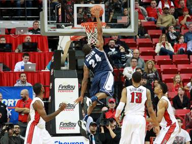 UNR guard Deonte Burton dunks on UNLV during their Mountain West Conference game Wednesday, Jan. 8, 2014 at the Thomas & Mack Center. UNR won 74-71, handing the Rebels their second straight home loss.