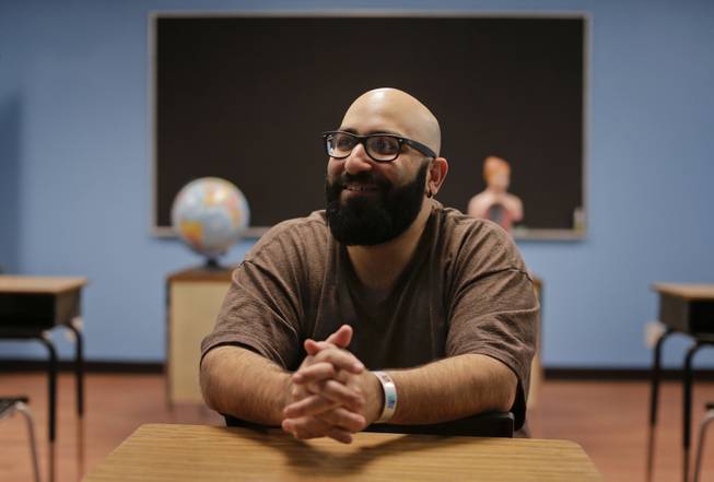 Studio owner and porn film director Lee Roy Myers talks about moving his business to Las Vegas during an interview on a classroom set at his studio, Mission Control Studios, Wednesday, Jan. 15, 2014, in Las Vegas. With increasing costs of doing business and a Los Angeles law requiring male actors to wear condoms, Myers moved his studio to Las Vegas last Spring and is part of the new boom in X-rated production in Sin City.