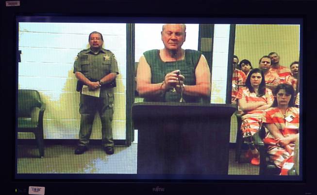 Curtis Reeves appears via video conference before Circuit Judge Lynn Tepper in Wesley Chapel, Fla. on Tuesday, Jan. 14, 2014. Tepper ordered Reeves, 71, held without bond on a charge of second-degree murder in the death of 43-year-old Chad Oulson on Monday. An argument over texting in a movie theater ended with Reeves, a retired police captain fatally shooting Oulson, authorities said.