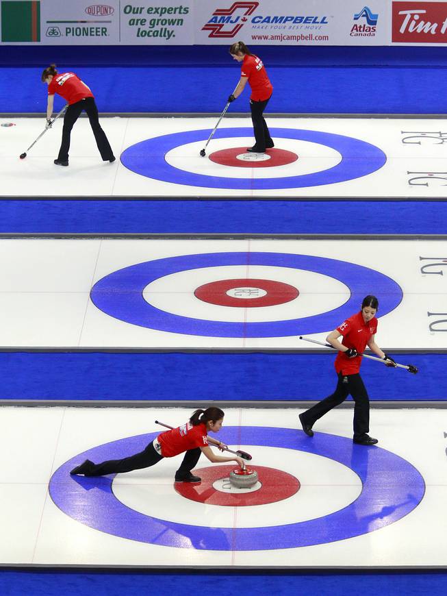 Curling athletes compete in the team competition during the first day of the 2014 World Financial Group Continental Cup of Curling at the Orleans Arena Thursday, Jan. 16, 2014. Of the twelve teams competing from around the world, nine of them will represent their respective country at the upcoming Olympics in Sochi, Russia.