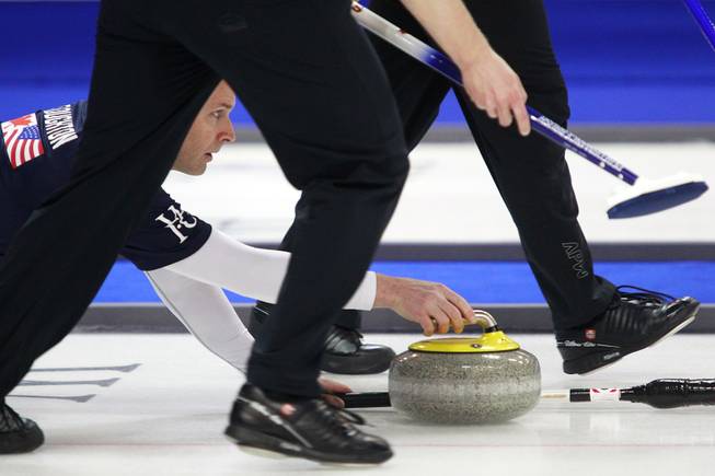 Jeff Stoughton releases a stone during the first day of the 2014 World Financial Group Continental Cup of Curling at the Orleans Arena Thursday, Jan. 16, 2014. Of the twelve teams competing from around the world, nine of them will represent their respective country at the upcoming Olympics in Sochi, Russia.