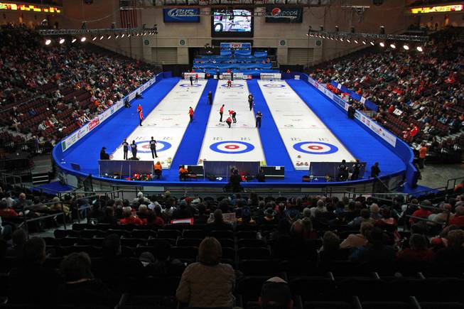Curling athletes compete during the first day of the 2014 World Financial Group Continental Cup of Curling at the Orleans Arena Thursday, Jan. 16, 2014. Of the twelve teams competing from around the world, nine of them will represent their respective country at the upcoming Olympics in Sochi, Russia.