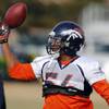 Photo: Denver Broncos linebacker Brandon Marshall reaches Photo: Denver Broncos linebacker Brandon Marshall reaches