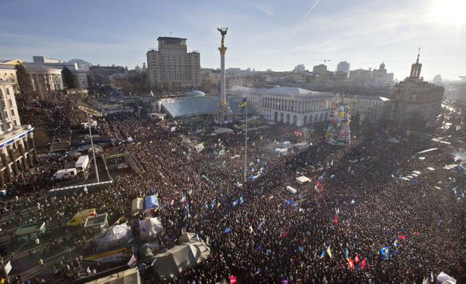Pro-European Union activists gather in Independence Square in Kiev, Ukraine, Sunday, Dec. 22, 2013. Ukraine has been stricken with mass protests for over a month. Protesters are demanding the resignation of President Viktor Yanukovych over his decision to ditch a pact with the European Union in favor of closer ties with Russia.