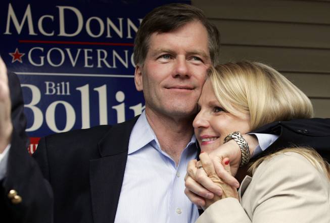 In this Oct. 31, 2009, file photo, Republican gubernatorial candidate Bob McDonnell, hugs his wife, Maureen, during a rally in Richmond, Va. McDonnell and his wife were indicted Tuesday, Jan. 21, 2014, on corruption charges after a federal investigation into gifts the Republican received from a political donor.