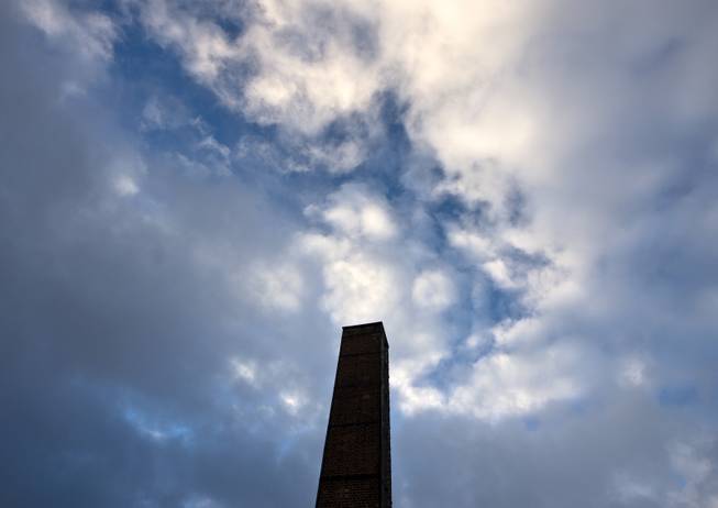 The sun shines behind the cloudy sky and the crematory during the international Holocaust remembrance day at the Nazi concentration camp Buchenwald near Weimar, Germany, Monday, Jan. 27, 2014. The Soviet army liberated the largest Nazi death camp in Auschwitz, Poland on Jan. 27, 1945, where some 1.5 million people, mostly Jews were killed.