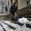 Photo: U.S. Parks Service employee Danny Merced clears sn Photo: U.S. Parks Service employee Danny Merced clears sn