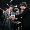 Photo: Paul McCartney, right, shows his guitar to host Ed Photo: Paul McCartney, right, shows his guitar to host Ed
