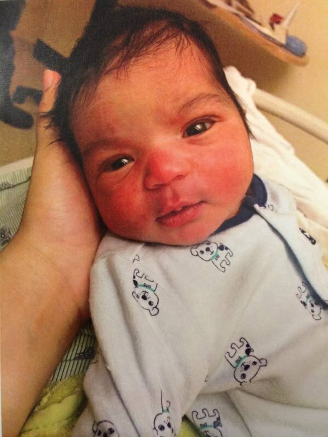 This undated file photo released by Town of Beloit Police Department shows Kayden Powell. Wisconsin police said Friday, Feb. 7, 2014, the missing newborn from a southern Wisconsin home has been found alive, swaddled in a tote bag outside a gas station in eastern Iowa. Authorities say the child appears to be in good condition.