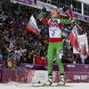 Belarus' Darya Domracheva celebrates winning the gold medal in the women's biathlon 12.5k mass-start, at the 2014 Winter Olympics, Monday, Feb. 17, 2014, in Krasnaya Polyana, Russia. Belarus' Darya Domracheva celebrates winning the gold medal in the women's biathlon 12.5k mass-start, at the 2014 Winter Olympics, Monday, Feb. 17, 2014, in Krasnaya Polyana, Russia.