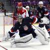 USA goaltender Jonathan Quick comes out of the crease to defend the goal in the third period of a men's ice hockey game at the 2014 Winter Olympics, Saturday, Feb. 15, 2014, in Sochi, Russia. USA goaltender Jonathan Quick comes out of the crease to defend the goal in the third period of a men's ice hockey game at the 2014 Winter Olympics, Saturday, Feb. 15, 2014, in Sochi, Russia.