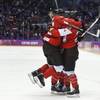 Marie-Philip Poulin of Canada (29) celebrates with teammates after scoring the tying goal against the USA during the third period of the women's gold medal ice hockey game at the 2014 Winter Olympics, Thursday, Feb. 20, 2014, in Sochi, Russia. Marie-Philip Poulin of Canada (29) celebrates with teammates after scoring the tying goal against the USA during the third period of the women's gold medal ice hockey game at the 2014 Winter Olympics, Thursday, Feb. 20, 2014, in Sochi, Russia.