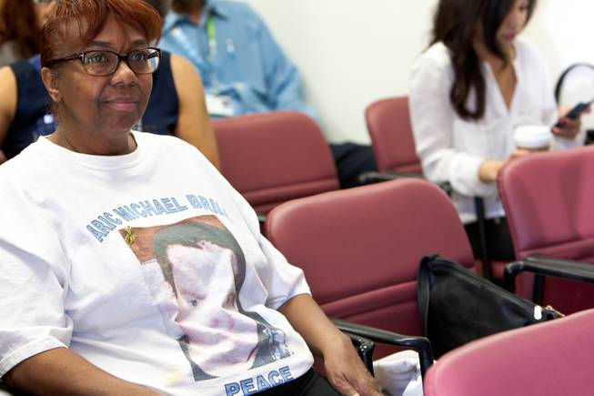"Granny" Candace Mbaye wears a T-shirt in memory of 16-year-old Aric Michael Brill, who donated six organs following his homicide five years ago, during a ceremony at the UMC Transplant Center Friday, February 21, 2014. Granny used to cook Brill's favorite fried chicken for him while he frequently visited her home.