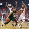 Colorado State guard Daniel Bejarano is defended by UNLV guard Jelan Kendrick, left, and forward Khem Birch during the first half of their Mountain West Conference game Wednesday, Feb. 26, 2014 at the Thomas & Mack Center. Colorado State guard Daniel Bejarano is defended by UNLV guard Jelan Kendrick, left, and forward Khem Birch during the first half of their Mountain West Conference game Wednesday, Feb. 26, 2014 at the Thomas & Mack Center.