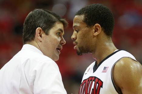 UNLV coach Dave Rice talks to Bryce Dejean-Jones in a game against Colorado State, Feb. 26, 2014, at the Thomas & Mack Center. UNLV won 78-70.