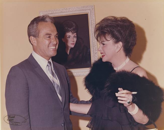 Stan Irwin was not only a producer and actor, but he helped bring the .Beatles, and, as shown here, Judy Garland to Las Vegas. She played at 2am at the Sahara, drawing capacity crowds even at that hour. The two are shown here in front of a portrait of Garland at the Thunderbird Hotel on June 27, 1965.