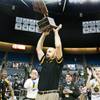 Head coach Chad Beeten raises the NIAA championship trophy overhead Saturday, March 1, 2014 as Clark High School defeated Elko High School 43-25 winning the Division I-A state championship at Lawlor Event Center in Reno. Head coach Chad Beeten raises the NIAA championship trophy overhead Saturday, March 1, 2014 as Clark High School defeated Elko High School 43-25 winning the Division I-A state championship at Lawlor Event Center in Reno.