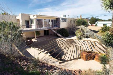 The backyard of the Elvis House, 2520 Castlesands Way, has fallen into disrepair. The home was last listed for sale in March 2011 for $225,000 by Tiffany and Tandi Huizenga, who had tried to sell the property three years earlier for $877,000.