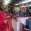 Photo: Michael Jones, left, co-owner of A Cut Above The R Photo: Michael Jones, left, co-owner of A Cut Above The R